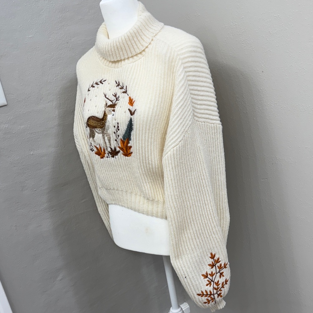Cozy Cream Sweater with Embroidered Design